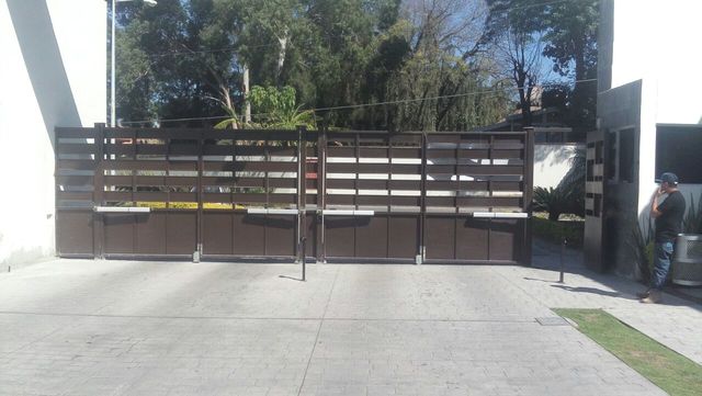 DESPUES:  INSTALACION DE PISTONES HIDRAULICOS  FAAC 400